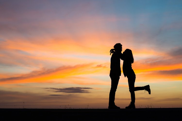 Silhouette of young couple in love